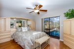 Guest bedroom with direct access to the lanai and pool